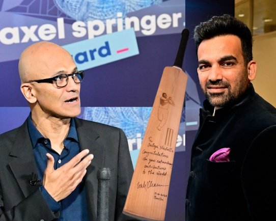 Satya Nadella receives an autographed bat from Zaheer Khan at Axel Springer Awards