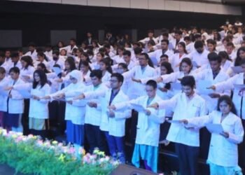Future doctors taking oath during white coat ceremony at AIMSR, Hyderabad