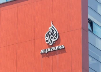 Two Al Jazeera journalists in Gaza are severely wounded in an Israeli strike, with one at risk of losing his life. The network calls it a deliberate targeting of its crew and condemns Israel's actions.
